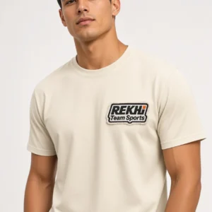 Rekhi Team Sports 100% Cotton T-Shirt — Distressed Embroidered Patch — front worn — OEM custom apparel
